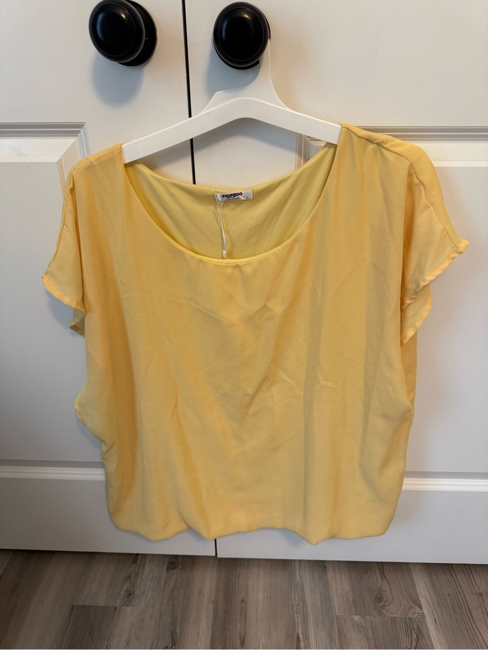 Two women professional outfits yellow & red